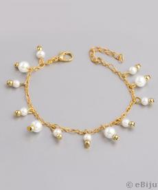 Brăţară aurie cu perle de sticlă albe